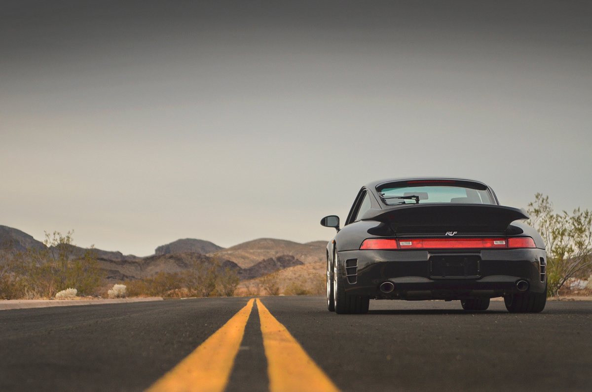 Rear view of the Black on Black 1998 RUF Turbo R available at RM Sotheby's Arizona Live Auction 2021